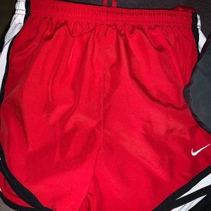 Red nike shorts